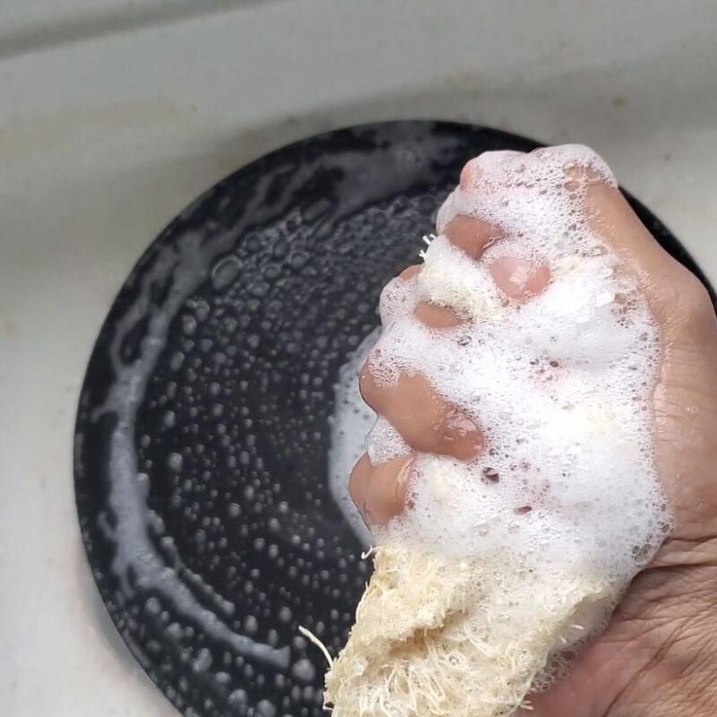 Eco-friendly cleaning with loofah scrub pads and NeerSol Dish soap