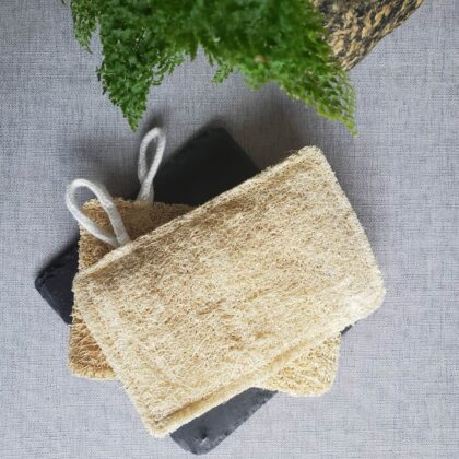 Eco-friendly natural loofah scrub pad extra large for body scrub, dish cleaning, and vegetable scrubbing.